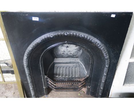 A cast iron fire surround with grate, 97cm high x 83cm wide Condition Report: Available upon request