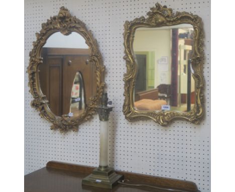 a brass and onyx column table lamp and two gilt wall mirrors (3) Condition Report: Available upon request