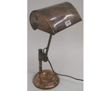 An early 20th Century copper desk lamp with height adjustment Condition Report: Available upon request