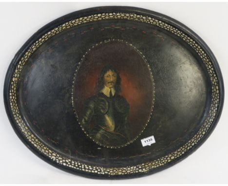 A papier mache oval tray with portrait of gentleman in armour, 49cm high x 62cm wide Condition Report: Available upon request