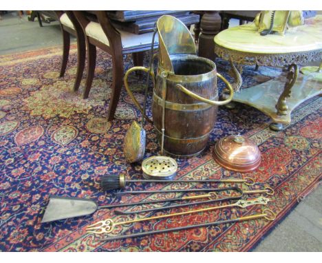 A coopered oak brass mounted coal scuttle, brass chestnut roasters, fire tools, etc