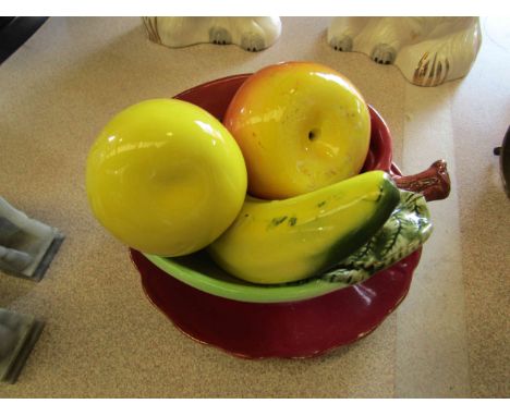 A selection of ceramic fruit in bowl