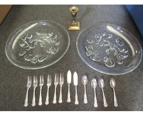A pair of glass dishes, brass squat candlestick and plated teaspoons, fish cutlery