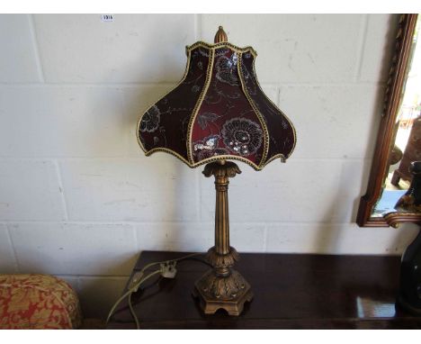 A table lamp with lined Eastern style shade, 70cm tall