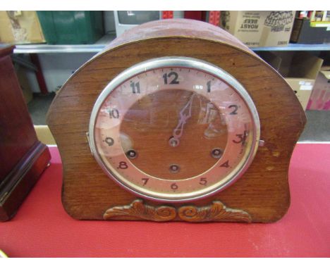 A 1930's oak cased mantel clock, 22cm tall   