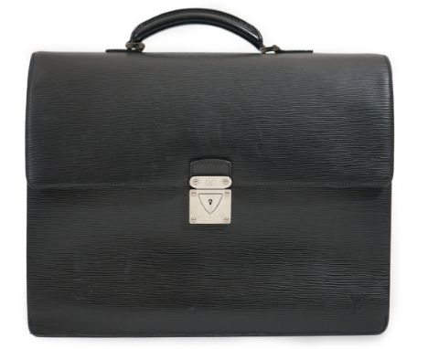 A Louis Vuitton Robusto briefcase in black taiga leather, hardware in silver metal, simple handle leather, locker fastener un