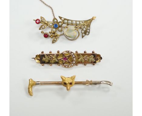 A 9ct and gem set fox head and riding crop bar brooch, 56mm, an Edwardian 9ct gold and gem set bar brooch and a rolled gold b