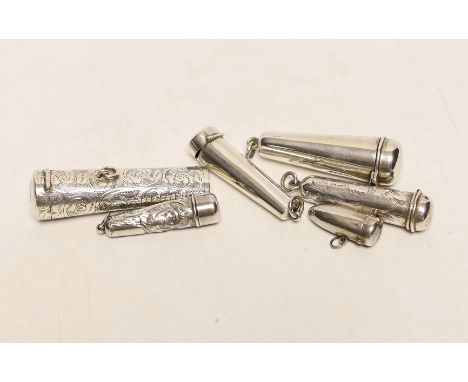 Six assorted mainly early 20th century silver cigar or cigarette holder cases, including two containing 9ct gold mounted ambe