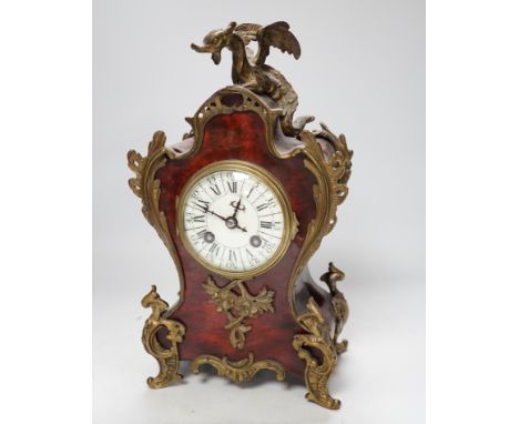 An early 20th century French red tortoiseshell veneered mantel clock with dragon mount, 30cm***CONDITION REPORT***PLEASE NOTE