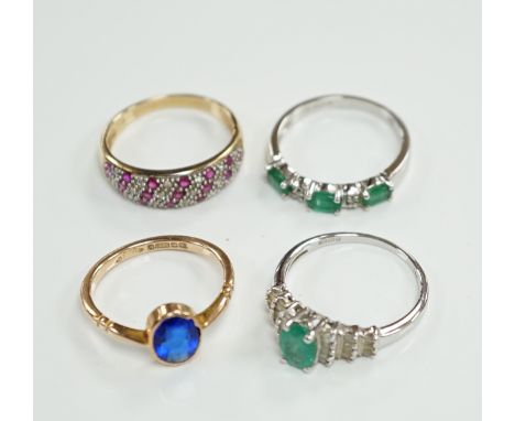 Three assorted modern 9ct gold and gem set rings including emerald and diamond chip set half hoop, size N, gross weight 6.8 g