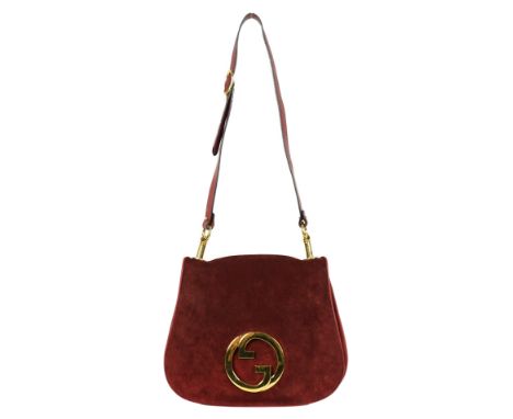 A vintage Gucci Blondie claret suede shoulder bag, Gucci gold toned intertwined double G logo is front and centre on this sup