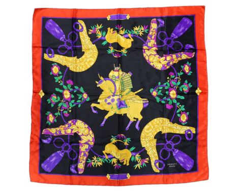 A Hermes silk scarf***CONDITION REPORT***PLEASE NOTE:- Prospective buyers are strongly advised to examine personally any good