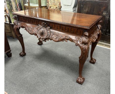 An 18th century style Irish style carved mahogany console table, width 136cm, depth 63cm, height 84cm***CONDITION REPORT***PL