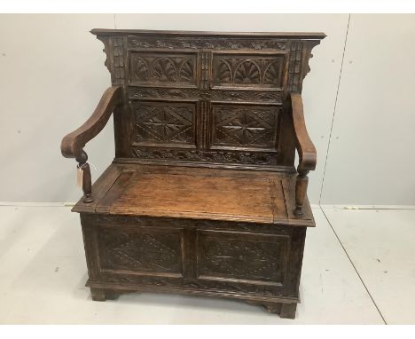 A small carved oak monk's bench, circa 1900, width 100cm, height 108cm***CONDITION REPORT***PLEASE NOTE:- Prospective buyers 
