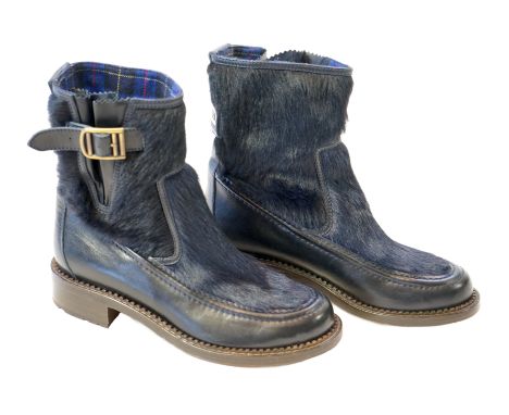 A pair of Chanel lady's navy blue leather calf hair pleated belted buckle boots, with blue tartan interior, with dust bag, it