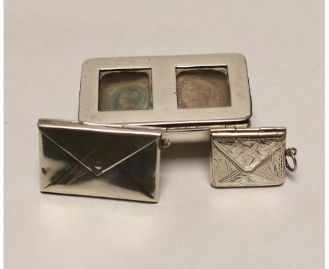 A late Victorian novelty silver double stamp case, modelled as a trough, Levi &amp; Salaman, Birmingham, 1899 and two other s