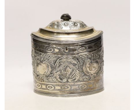 A George III silver oval tea caddy, with later embossed decoration, Peter &amp; Ann Bateman, London, 1796, height 15.2cm, gro