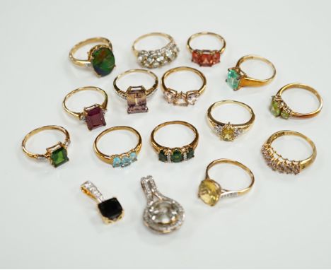 Thirteen assorted modern 9ct gold of 9k and gem set dress rings and a 9ct gold and gem set pendant, gross weight 40.2 grams, 