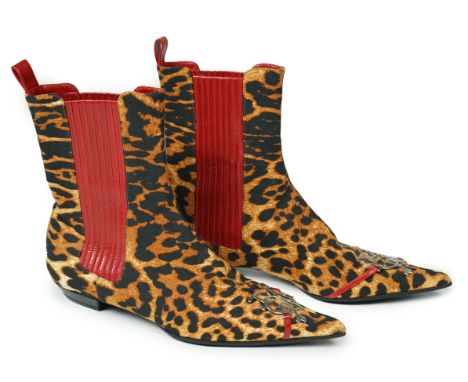 A pair of Christian Dior, Hardcore Collection, lady's leopard canvas ankle boots, with red leather trim and toe embellishment
