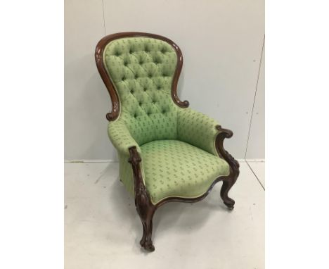 A Victorian carved mahogany button back armchair***CONDITION REPORT***PLEASE NOTE:- Prospective buyers are strongly advised t