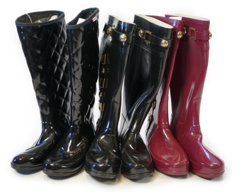 Three Pairs of lady's Hunter wellington boots, two the same style one in black the other pair in burgundy both with gold-tone