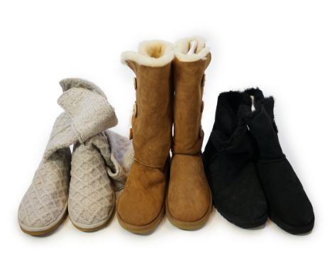 Three pairs of lady's low/mid height UGG sheepskin boots with side button design, in tan, black suede (shorter height) and li