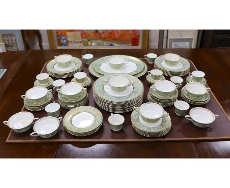 A Royal Worcester green and gilt decorated part dinner service***CONDITION REPORT***PLEASE NOTE:- Prospective buyers are stro