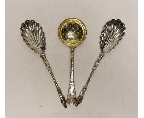 A pair of Victorian silver apostle serving spoons, Edward Hutton, London, 1890, 20.5cm and a George III silver sifter spoon, 