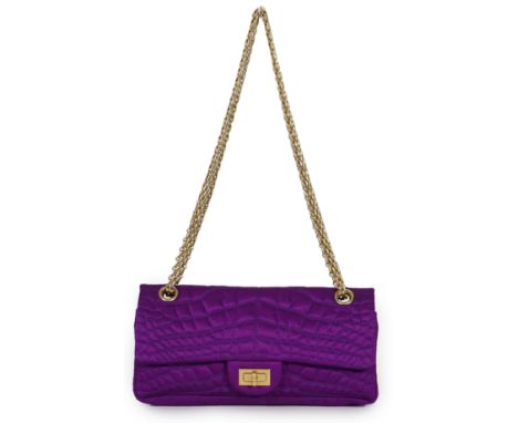 A Chanel medium-sized 2-55 bag in purple silk satin stitched with a quilted crocodile pattern, embellished with a mademoisell