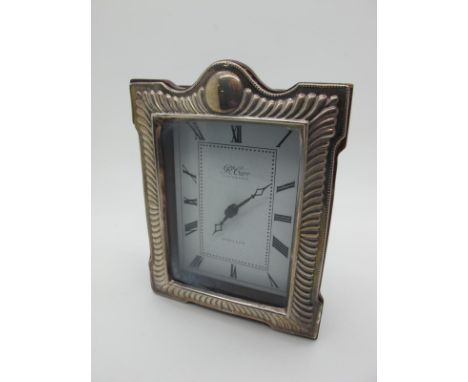 A Modern Carrs of Sheffield Hallmarked Silver Mounted Mantel Clock, overall height approximately 13cm high. 