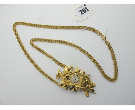 Trifari; A Novelty Cuckoo Clock Pendant Watch, the dial signed "Trifari"suspended on textured curb link chain. 