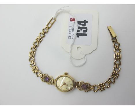 Sovereign; A 9ct Gold Ladies Wristwatch,the oval signed dial with line markers, in plain case, to openwork gate style bracele