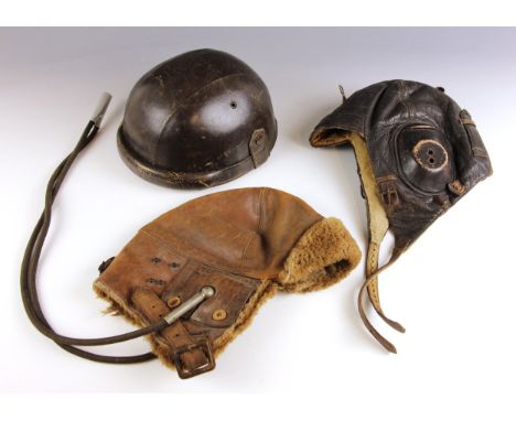 WORLD WAR II INTEREST: A German Luftwaffe 'LKpW101' winter flight helmet, of five panel brown leather construction, the leath