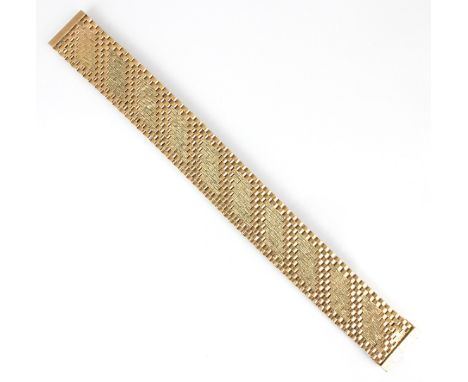 A mid 20th century 9ct rose gold bracelet, the gate link bracelet with ten textured panels, stamped ‘L&amp;*’ Birmingham 1968