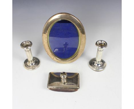 A selection of silver, including two similar Edwardian silver dwarf candlesticks, Charles S Green &amp; Co Ltd Birmingham 190