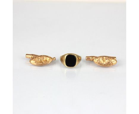 A pair of early 20th century rose gold cufflinks the hollow navette shaped cufflinks with engraved detail to front, with togg