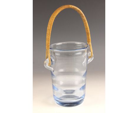 A Danish blue glass ice pail by Holmegaard, the rattan handle attached on prunted ribbed glass loops, engraved mark to base, 