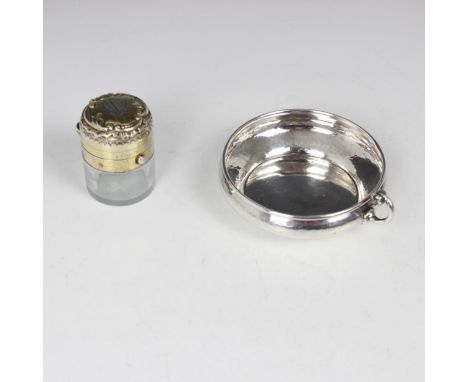 A Victorian silver gilt travelling inkwell, Thomas Johnson II, London 1880, the spring-loaded circular cover with monogram to