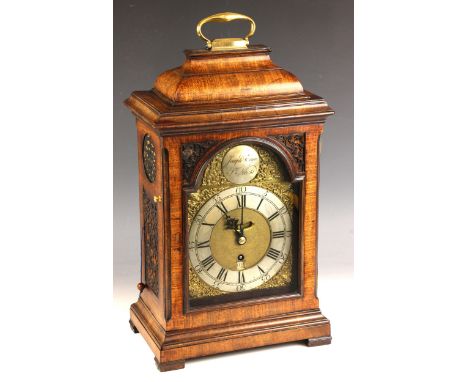 A George III mahogany cased single fusee bracket/table clock, the caddy form case with fretwork grilles enclosing the gilt me