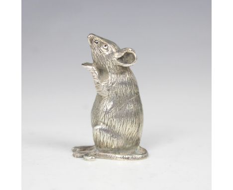 A late 20th century white metal novelty pepperette, modelled as a rat with realistically engraved detail, with screw to base,