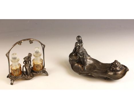 A Jugendstil pewter desk stand by WMF, late 19th or early 20th century, modelled as a maiden dipping her feet into a river, a
