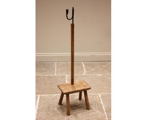 A George III Welsh sycamore floor standing rush light holder, the iron rush light holder upon a chamfered pole extending to a