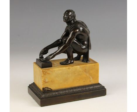 A Grand Tour patinated bronze figure modelled as 'Arrotino' [The Blade-Sharpener, also known as The Scythian'], 19th century 