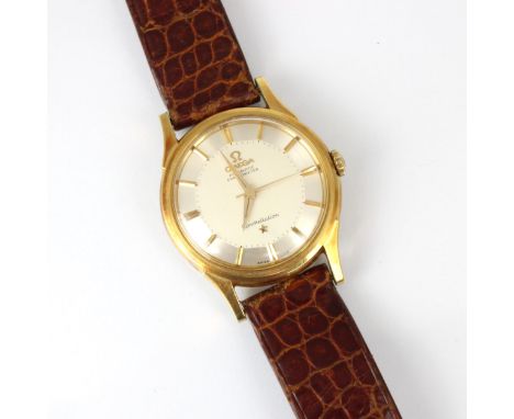 A yellow metal cased Omega Automatic Chronometer Constellation wristwatch, the circular silver coloured dial with baton marke
