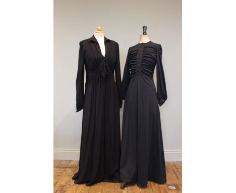 An Ossie Clark black crepe full length evening / dinner dress, with button and bow detail to the front and back, size 12-14 a