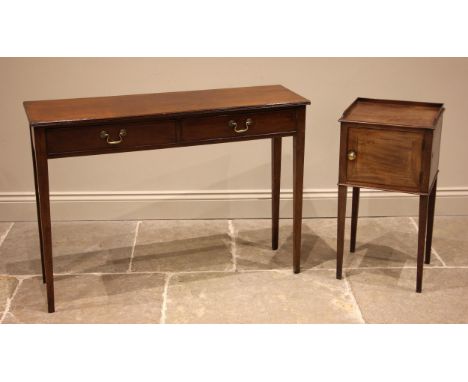 A  Georgian style mahogany console table, 20th century, the rectangular top with a reeded edge over a pair of cock beaded fri