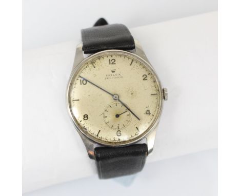 An early 20th century stainless steel Rolex Precision wristwatch, the silver coloured dial with baton and Arabic numerals, su