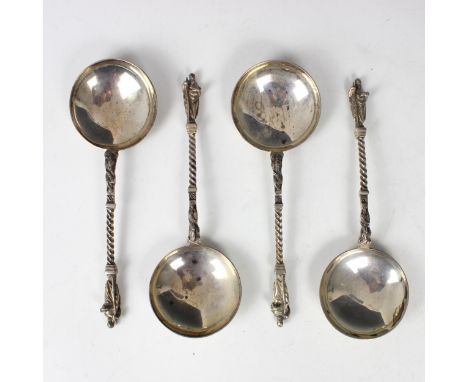 A set of four Victorian silver apostle style spoons, Martin Hall and Co, Sheffield 1892, the cast apostles above twist stem a