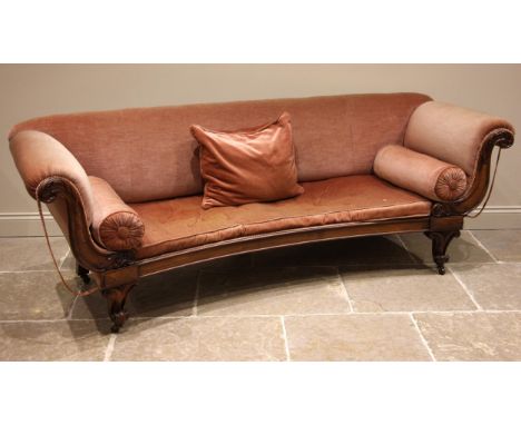 A William IV rosewood framed sofa, of crescent form, the padded scrolled arms enclosing the concave squab cushion, over a mou
