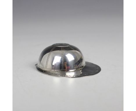 A George III silver novelty caddy spoon, Joseph Taylor, Birmingham 1798, designed as a jockey’s cap with engraved decoration,